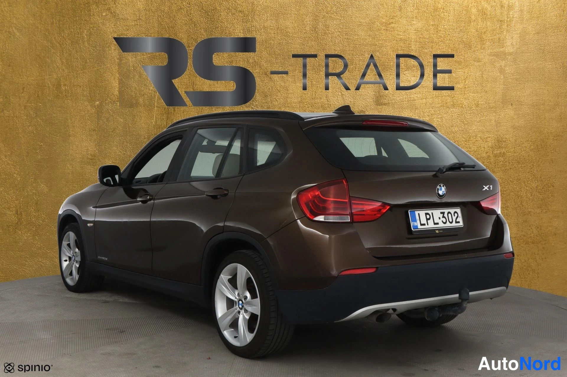 Ruskea BMW X1 2009, takaviisto, kuva 5