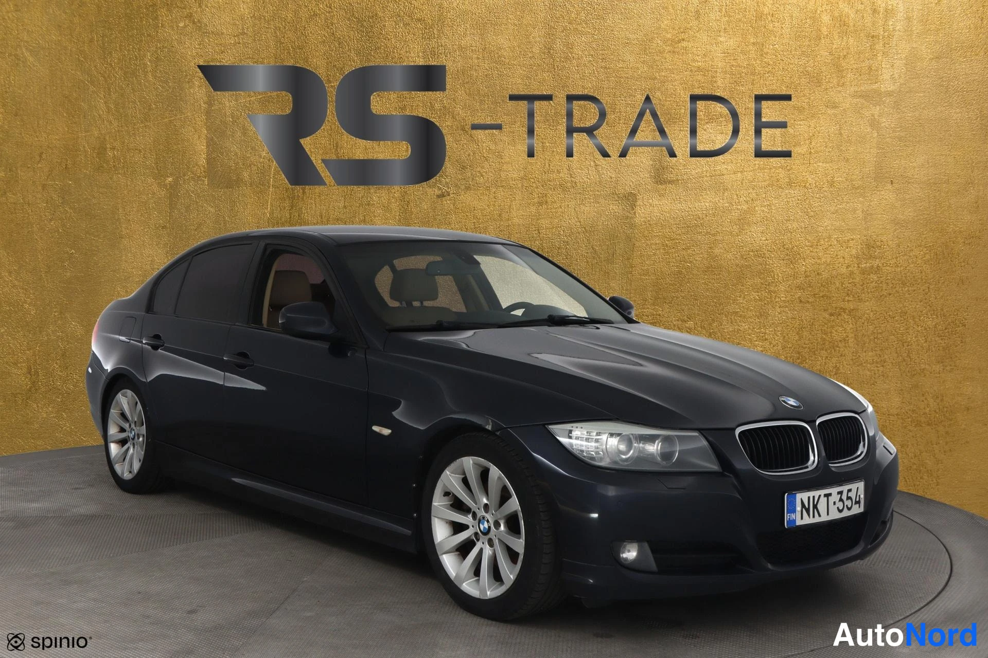 Sininen BMW 320d 2009, etuviisto, keula oikealle, kuva 3