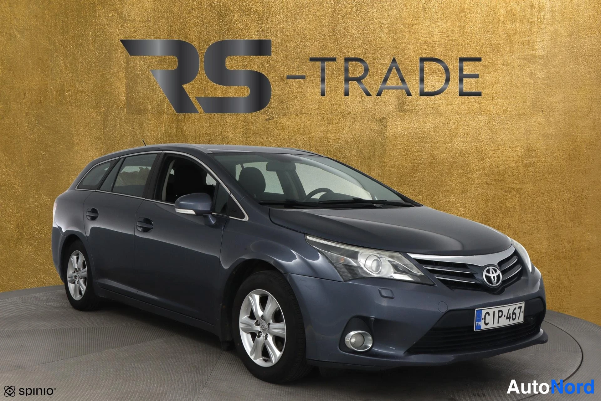 Blue Toyota Avensis 2012, front three-quarter, nose to the right, photo 2