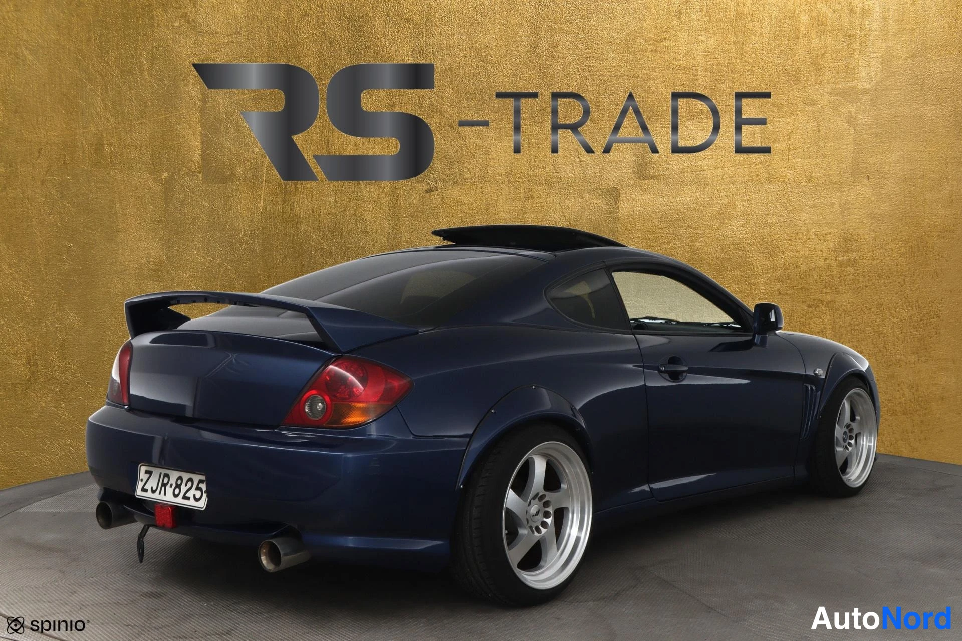 Sininen Hyundai Coupe 2004, takaviisto, kuva 3