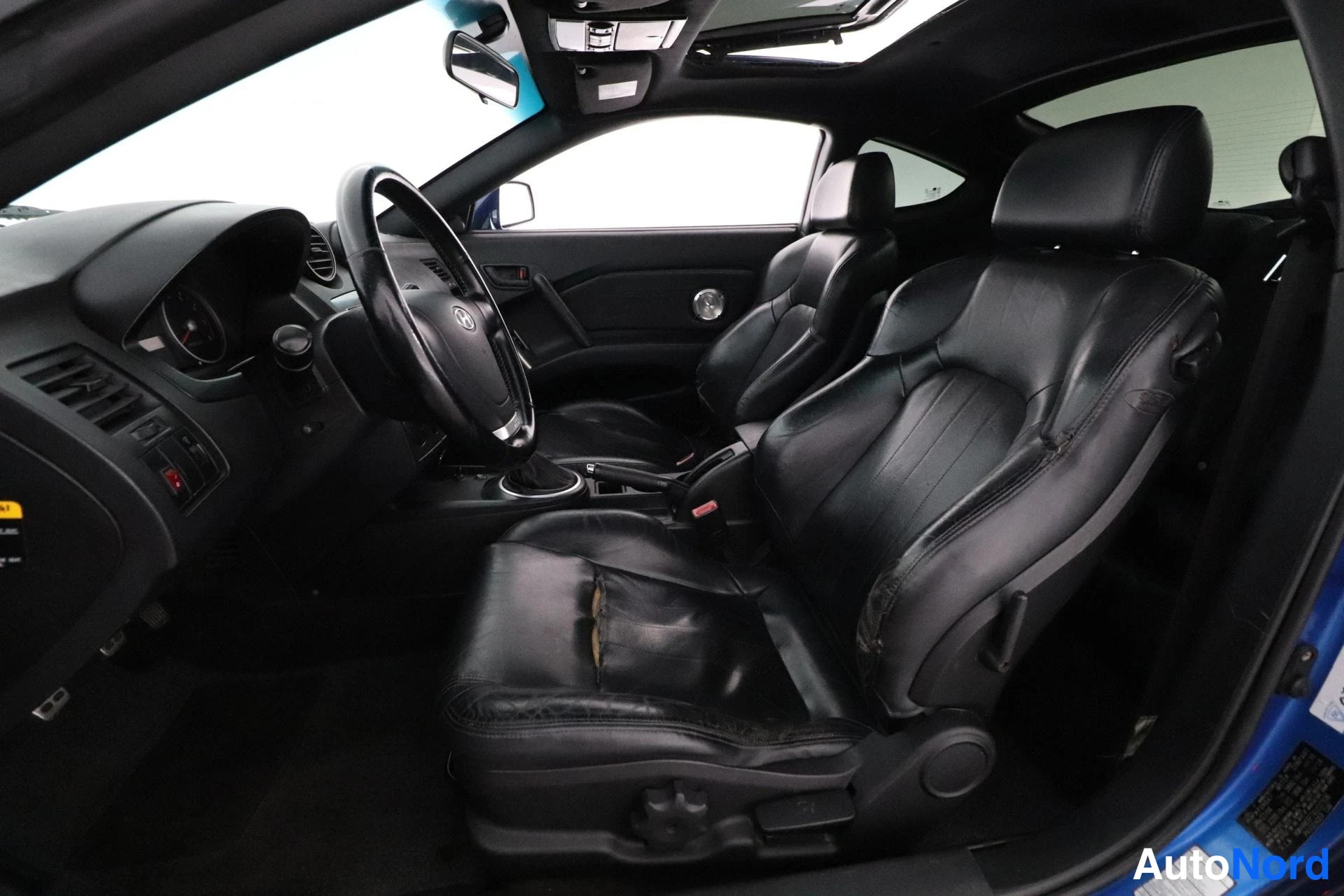 Sininen Hyundai Coupe 2004, ohjaamo, kuva 6