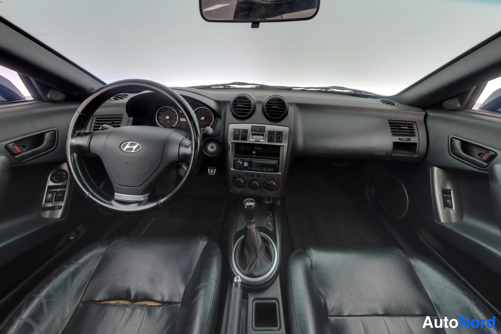 Sininen Hyundai Coupe 2004, ohjaamo, kuva 7