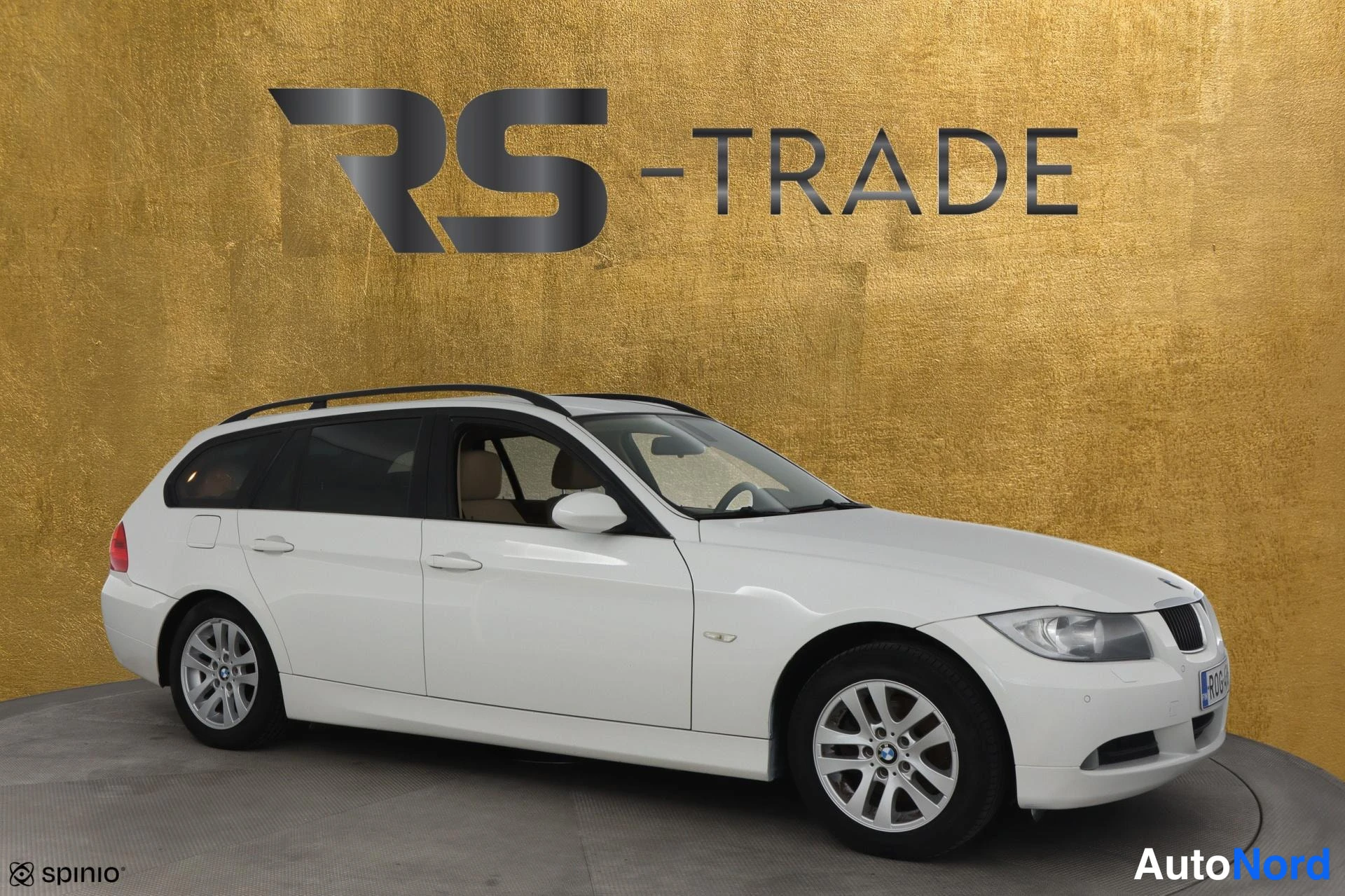 Valkoinen BMW 320i 2007, etuviisto, keula oikealle, kuva 2