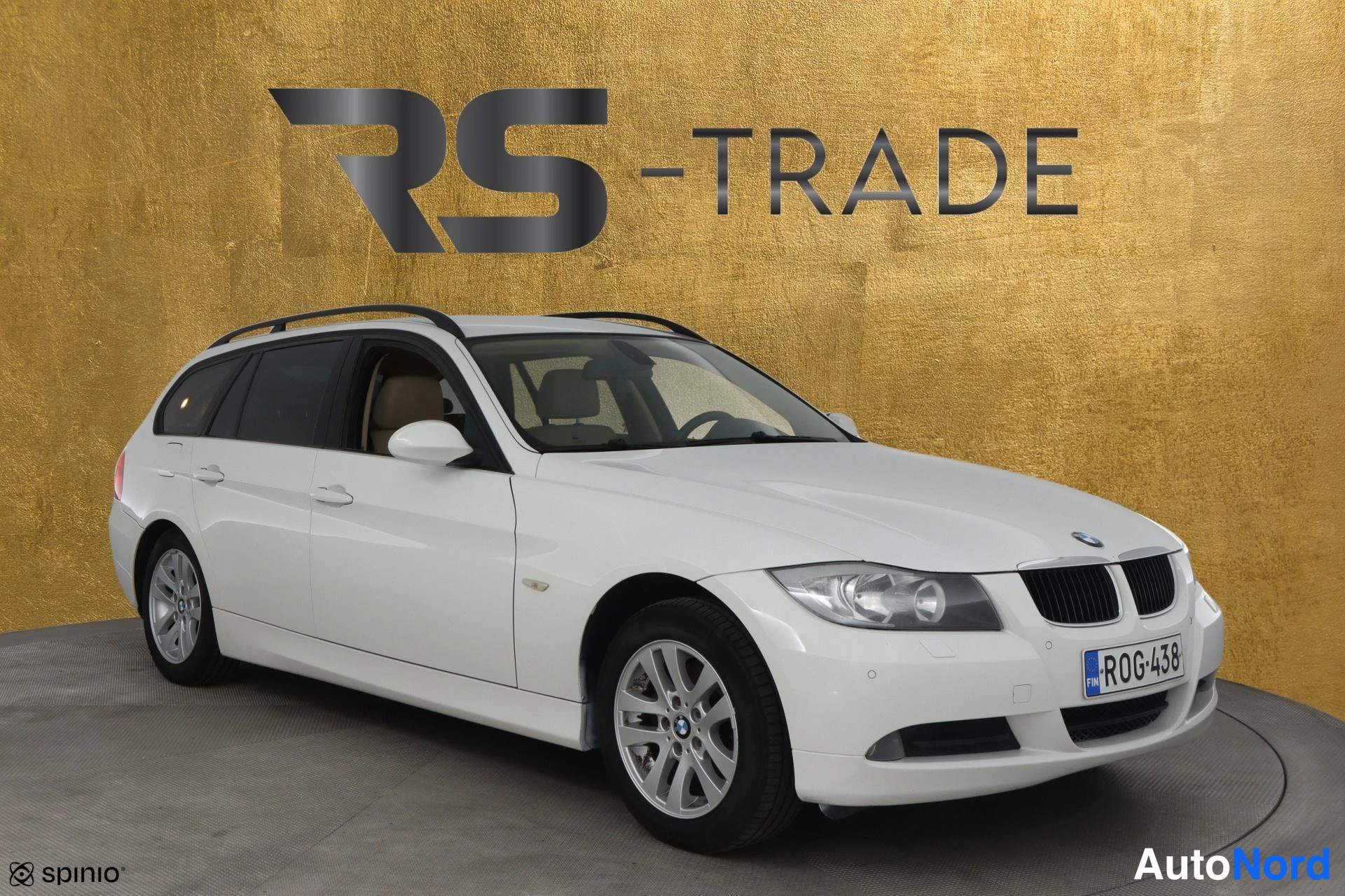Valkoinen BMW 320i 2007, etuviisto, keula oikealle, kuva 3
