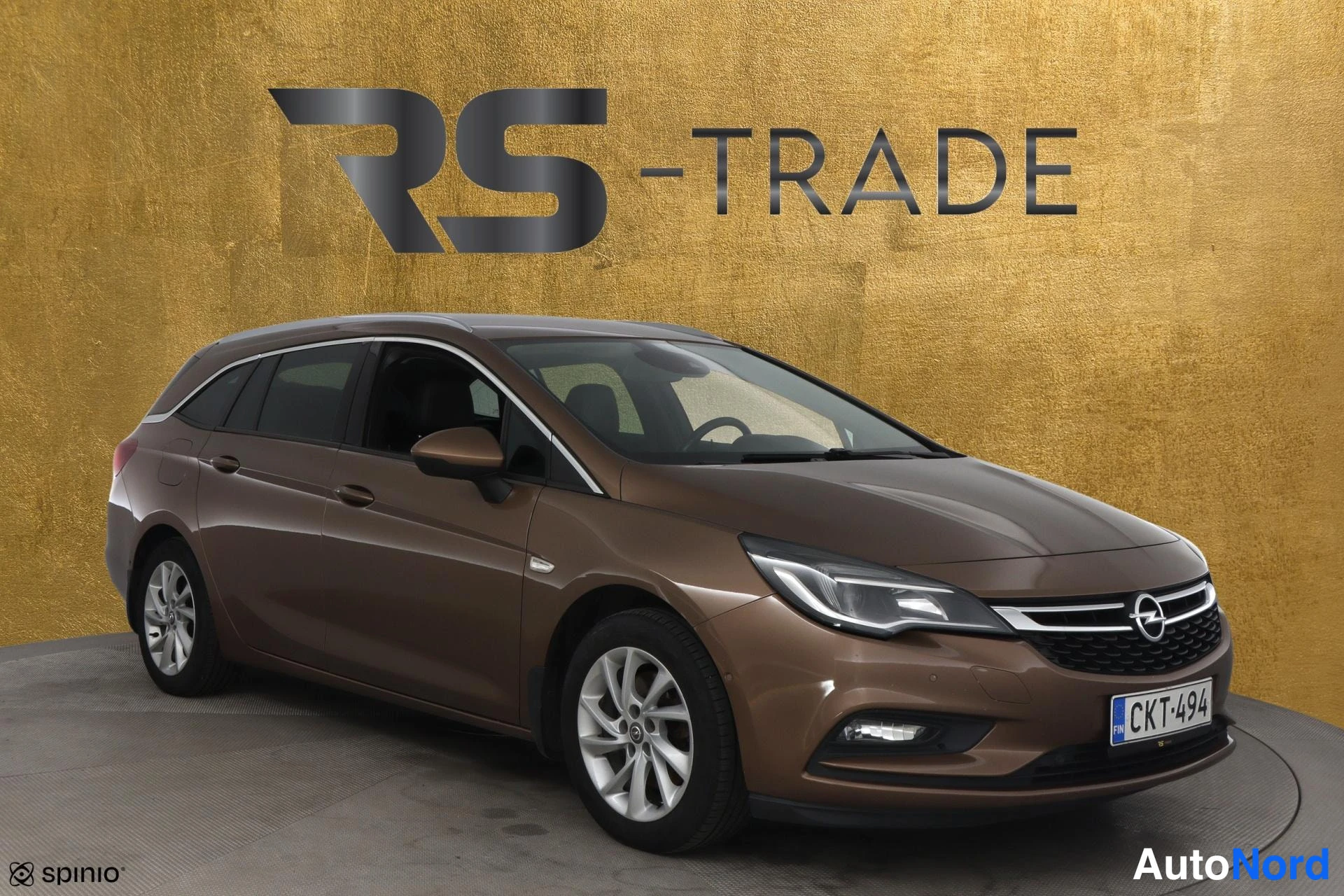 Ruskea Opel Astra 2017, etuviisto, keula oikealle, kuva 2