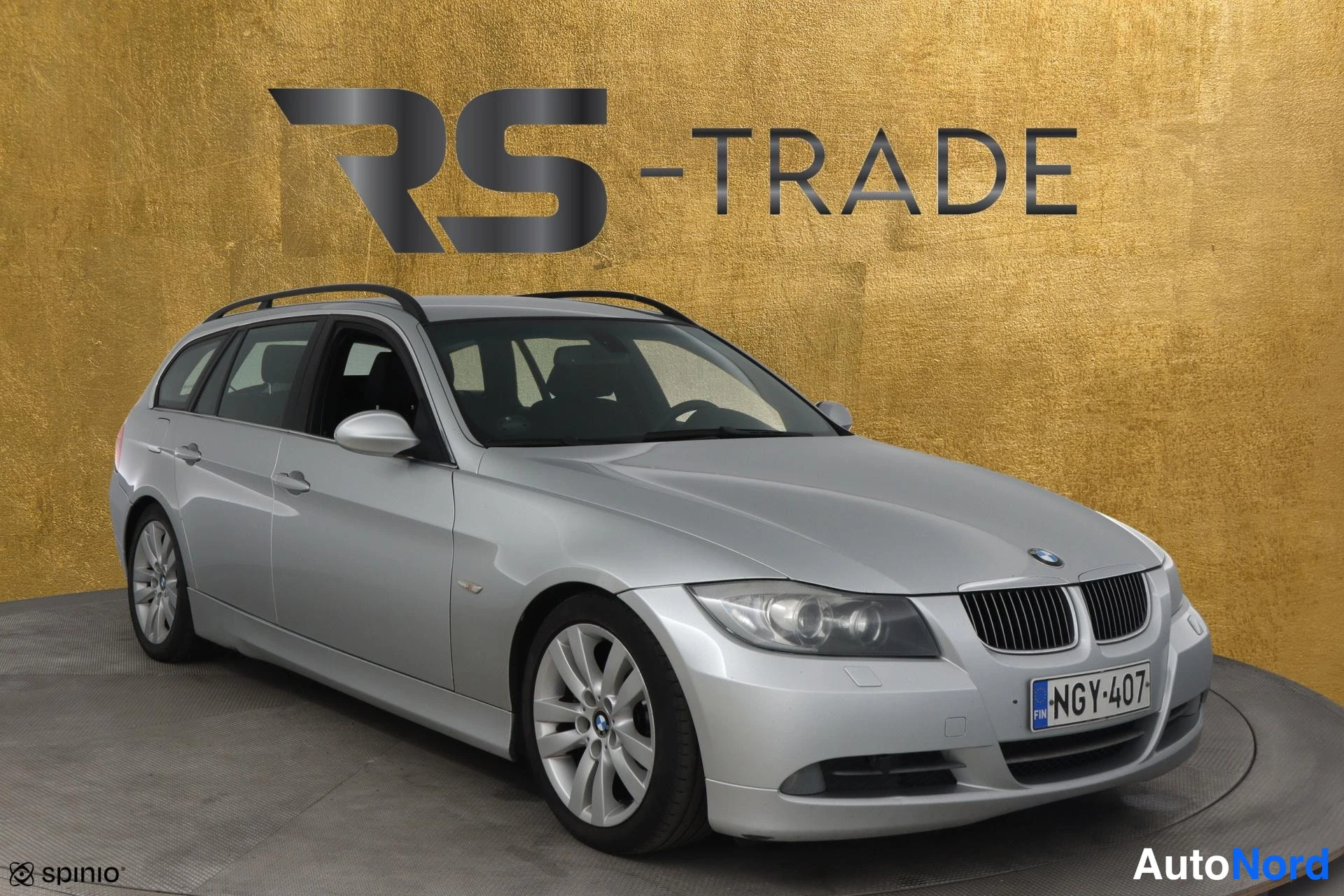 Grey BMW 330d 2006, front three-quarter, nose to the right, photo 2