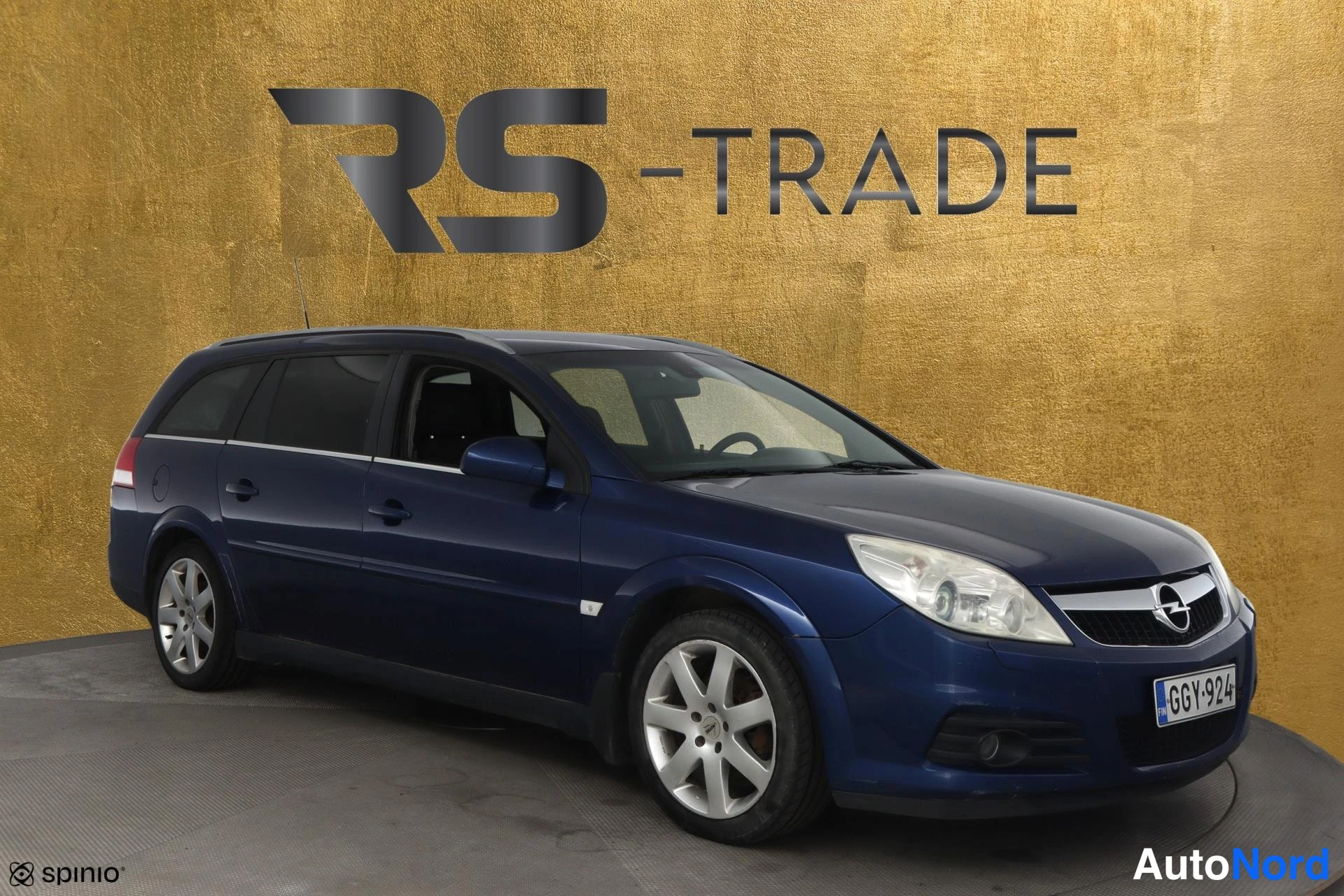 Sininen Opel Vectra 2006, etuviisto, keula oikealle, kuva 2