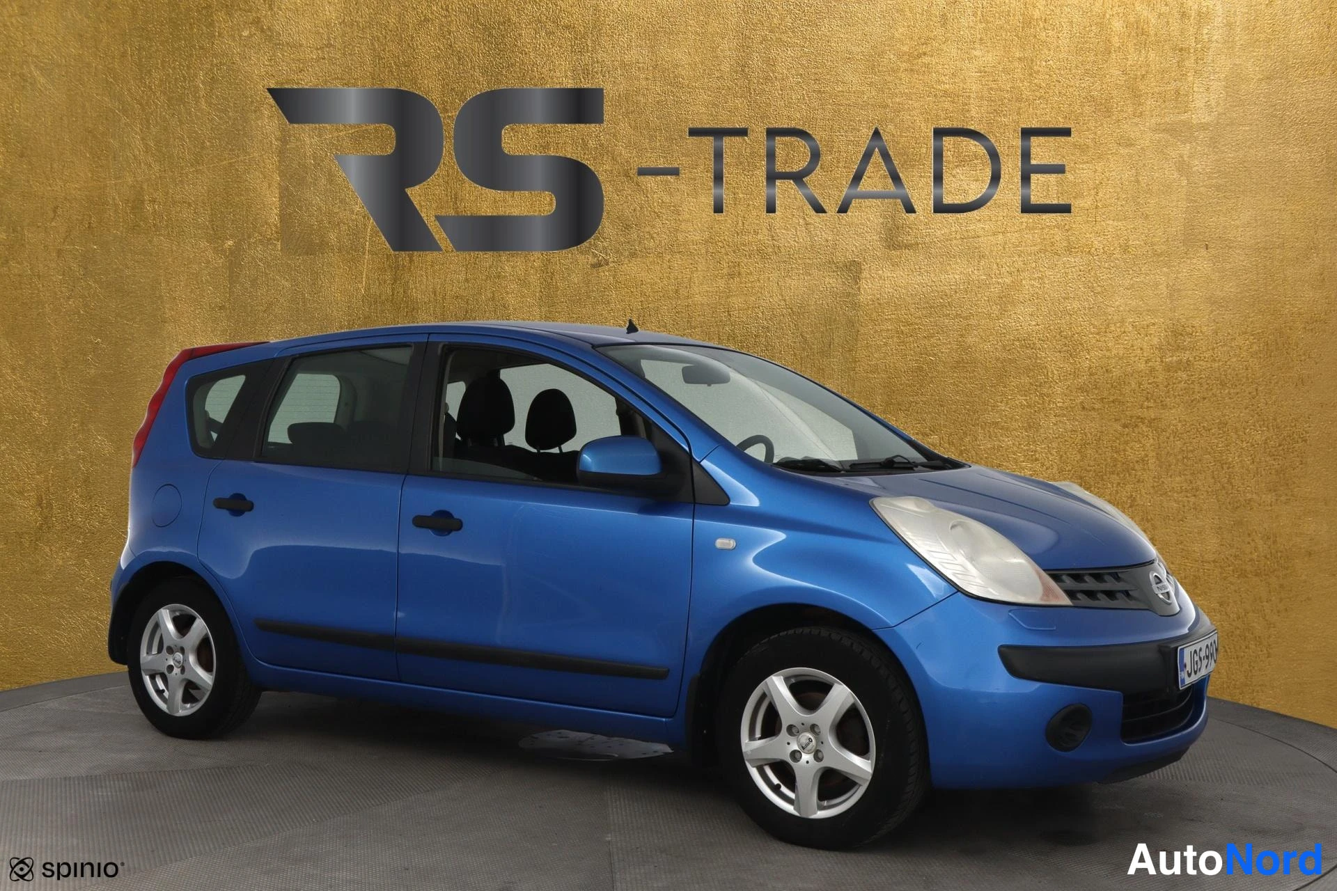 Sininen Nissan Note 2006, etuviisto, keula oikealle, kuva 2