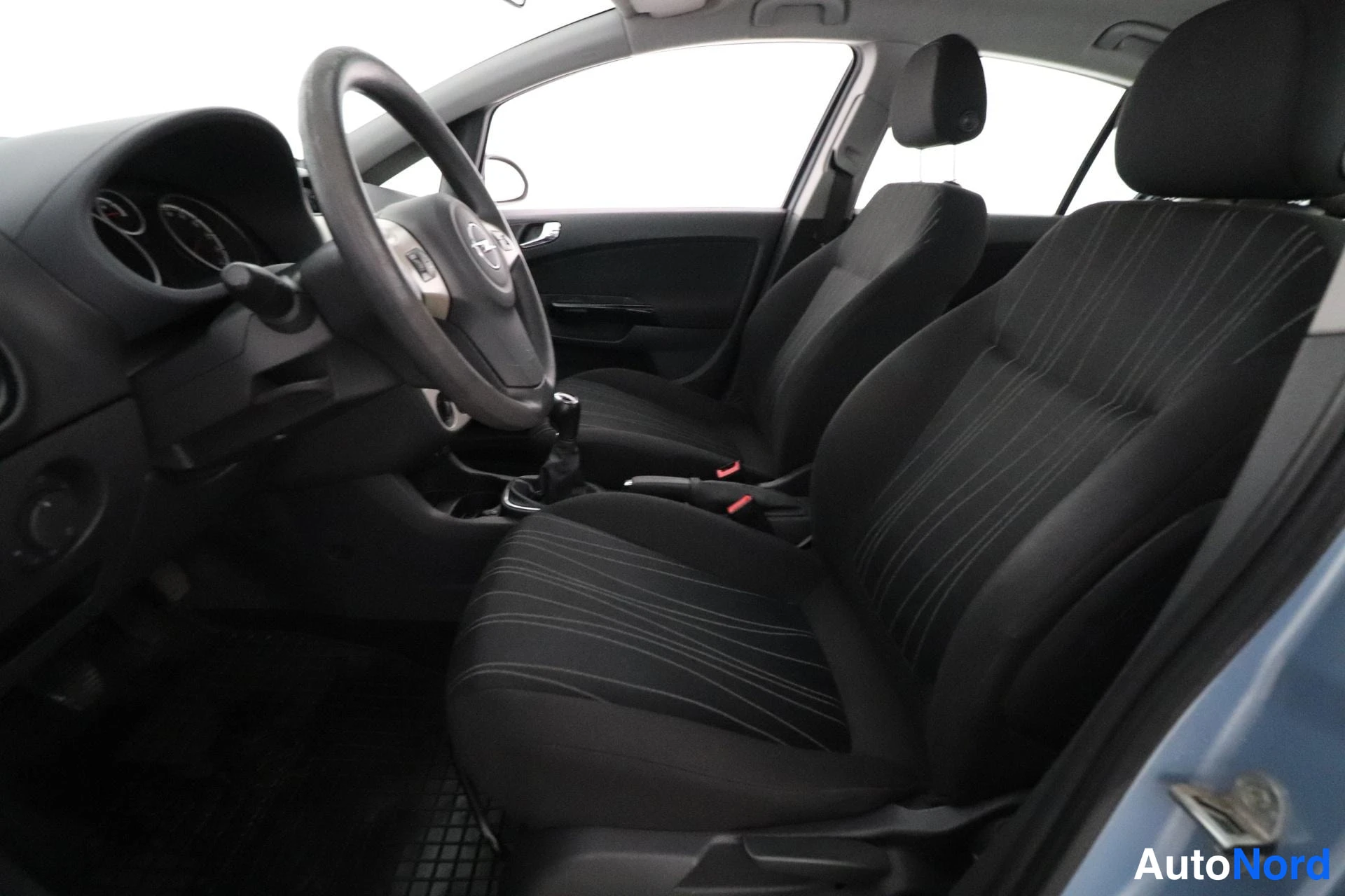 Sininen Opel Corsa 2007, ohjaamo, kuva 7