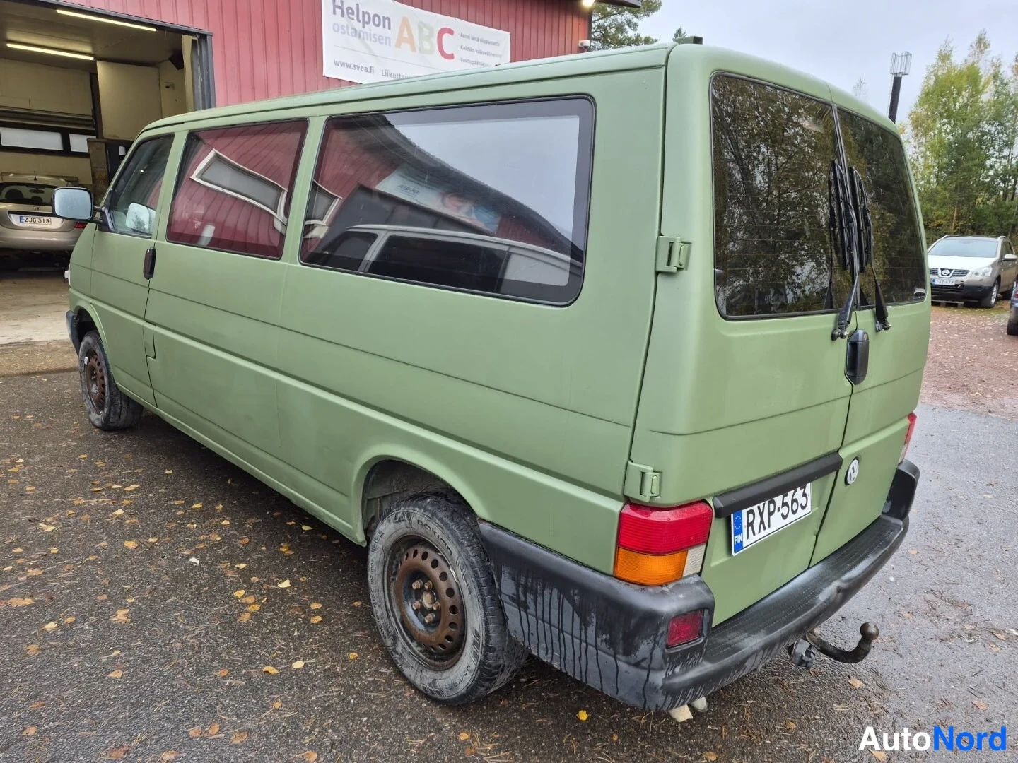Vihreä Volkswagen Caravelle 2003, takaviisto, kuva 7