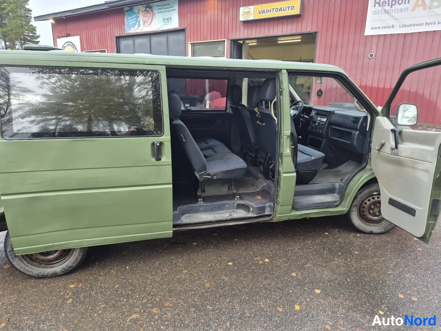 Vihreä Volkswagen Caravelle 2003, sivulta, kuva 5