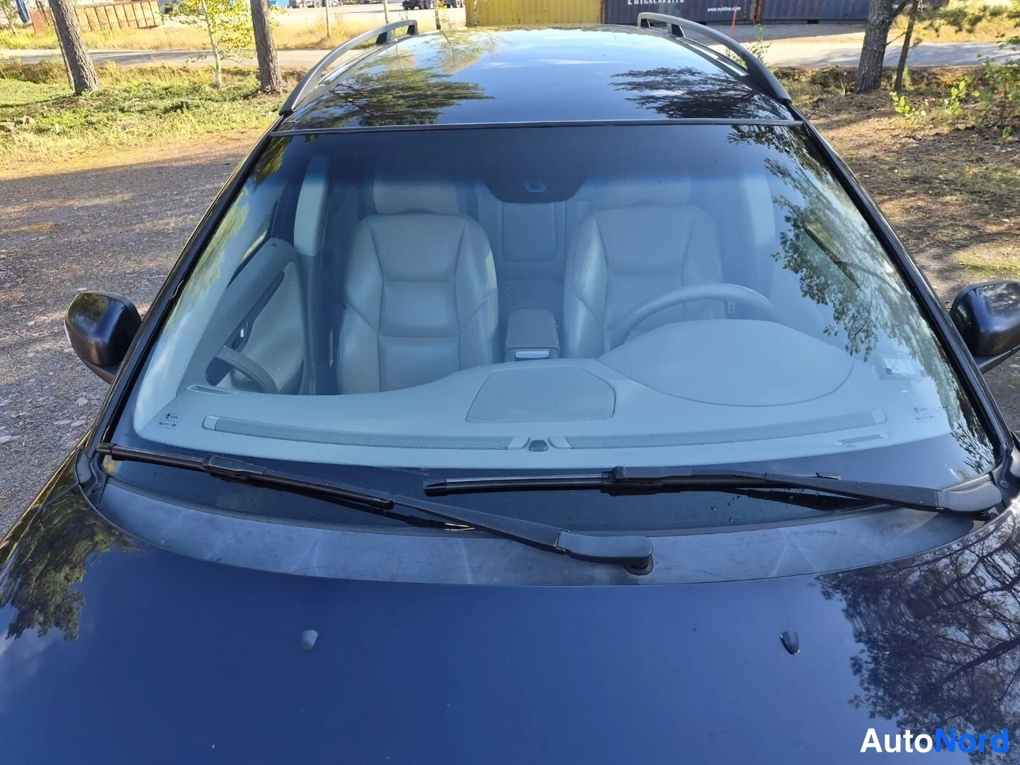 Sininen Volvo V70 2008, edestä, kuva 5