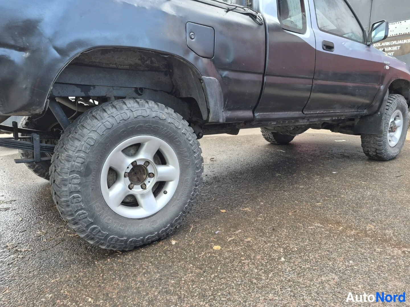 Sininen Toyota Hilux 1990, sivulta, kuva 8