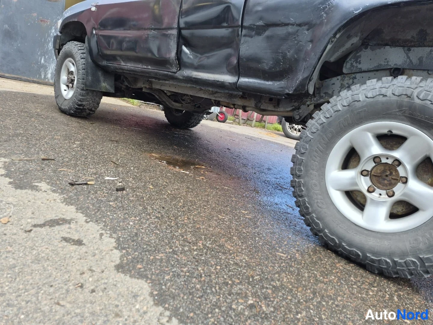 Sininen Toyota Hilux 1990, sivulta, kuva 9