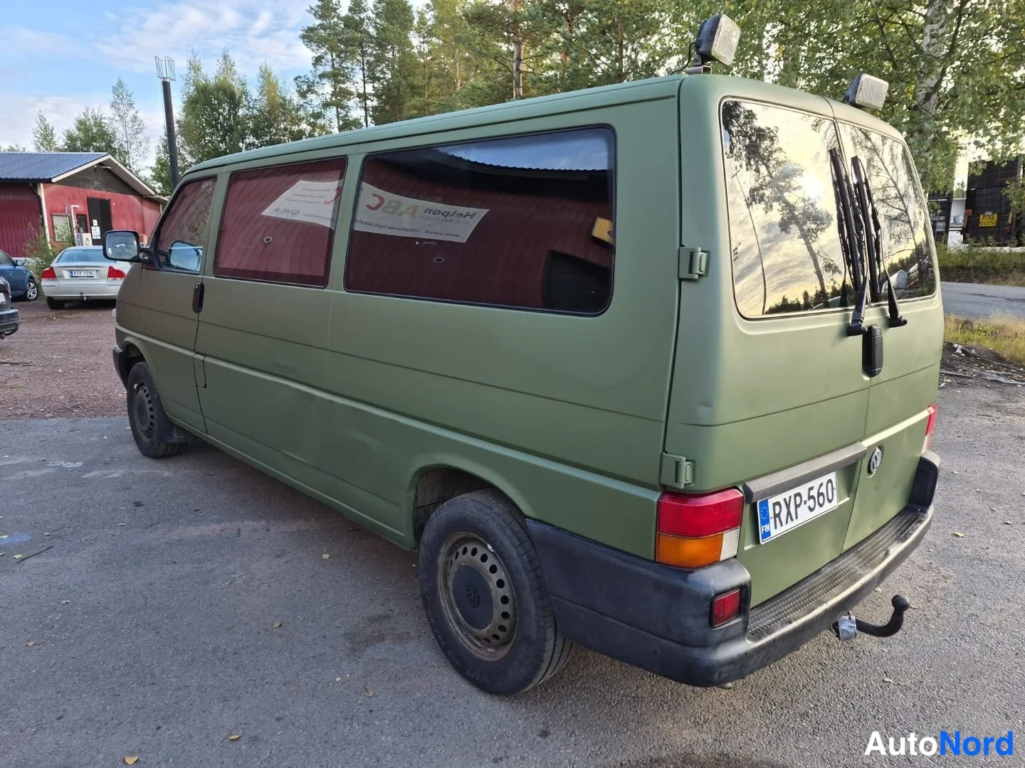 Vihreä Volkswagen Caravelle 2003, takaviisto, kuva 7