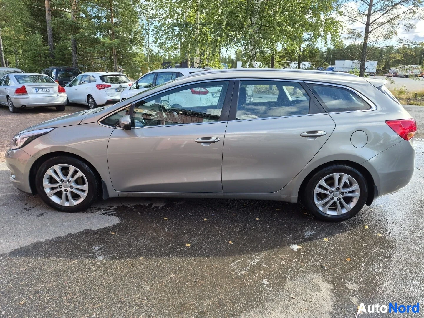 Beige Kia Ceed 2012, etuviisto, keula vasemmalle, kuva 2