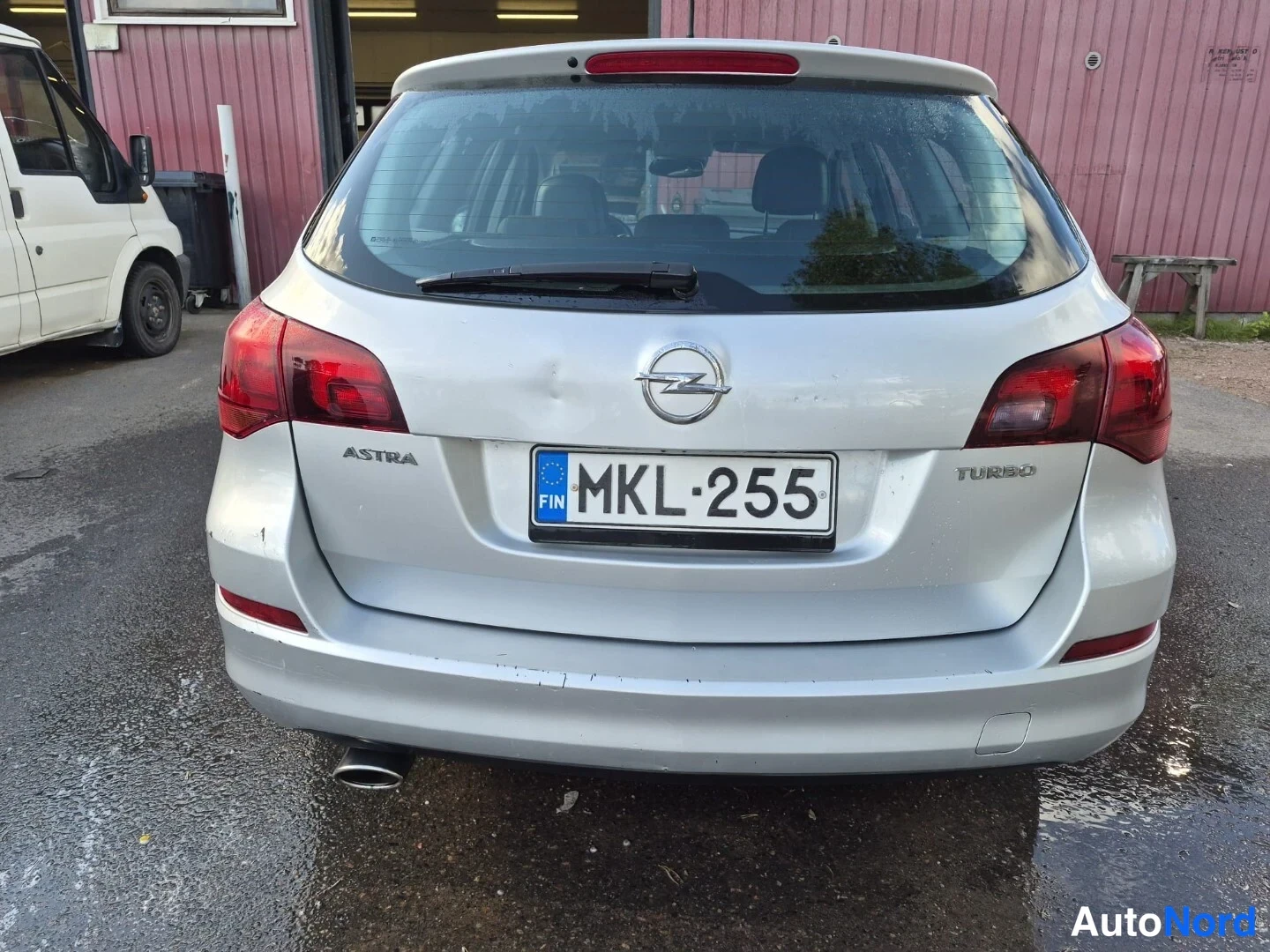 Harmaa Opel Astra SPORTS TOURER 2011, takaa, kuva 9
