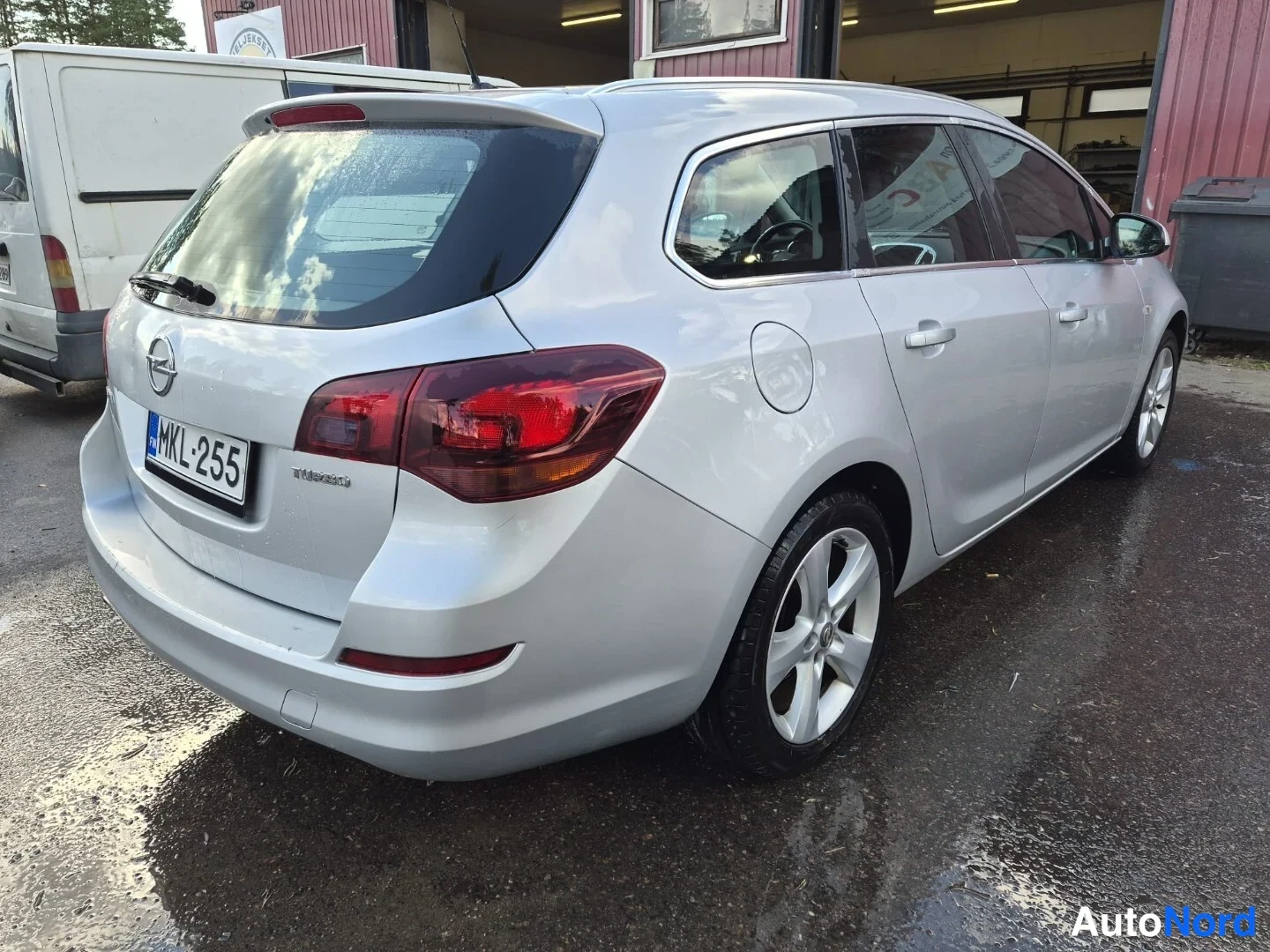 Harmaa Opel Astra SPORTS TOURER 2011, takaviisto, kuva 8