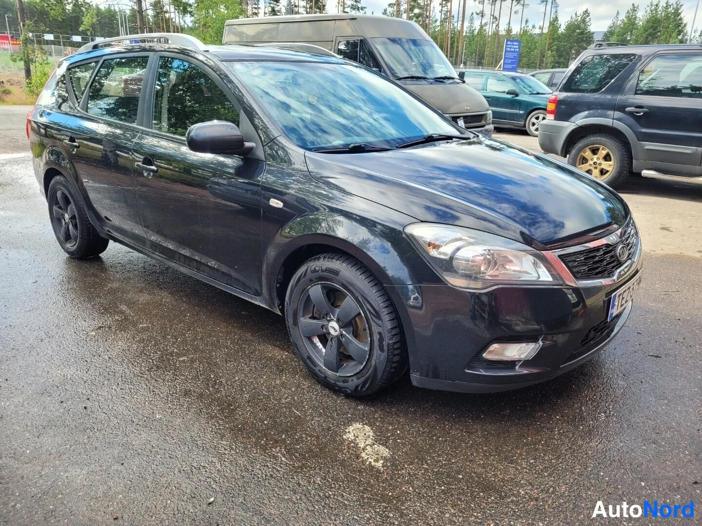 Musta Kia Ceed 2010, etuviisto, keula oikealle, kuva 3
