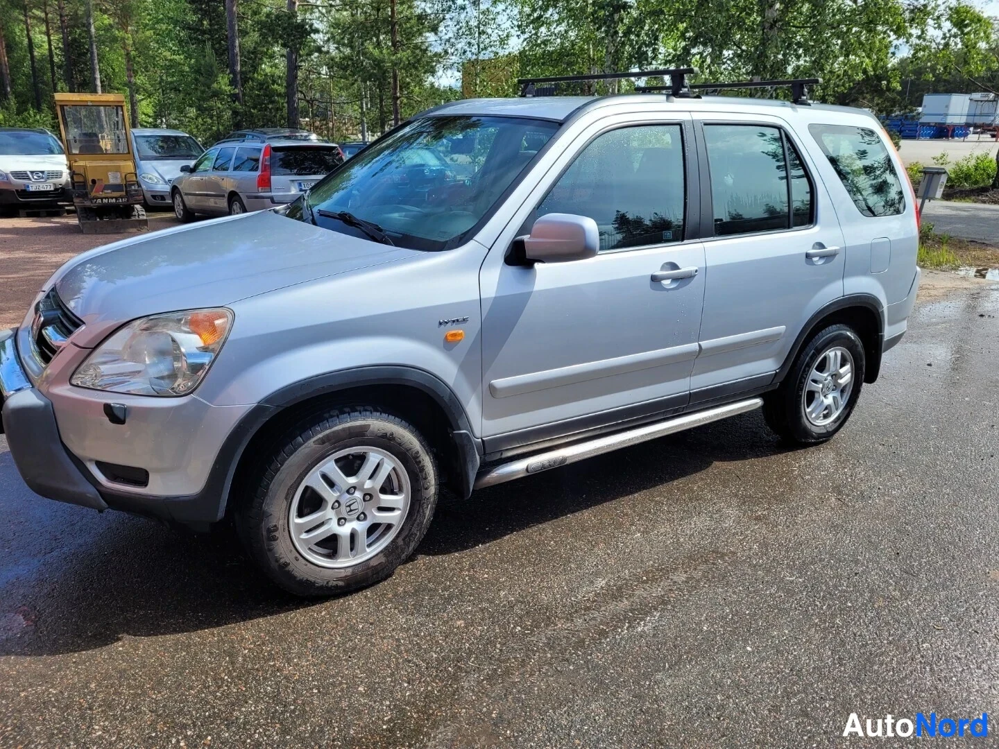 Silver Honda CR-V 2002, snett framifrån, fronten åt vänster, bild 2