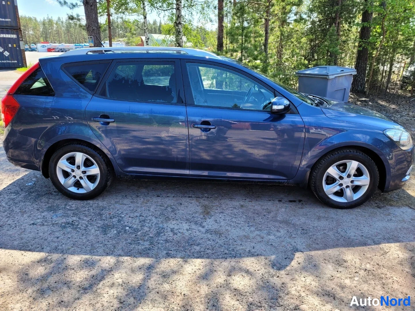 Sininen Kia Ceed 2011, sivulta, kuva 5