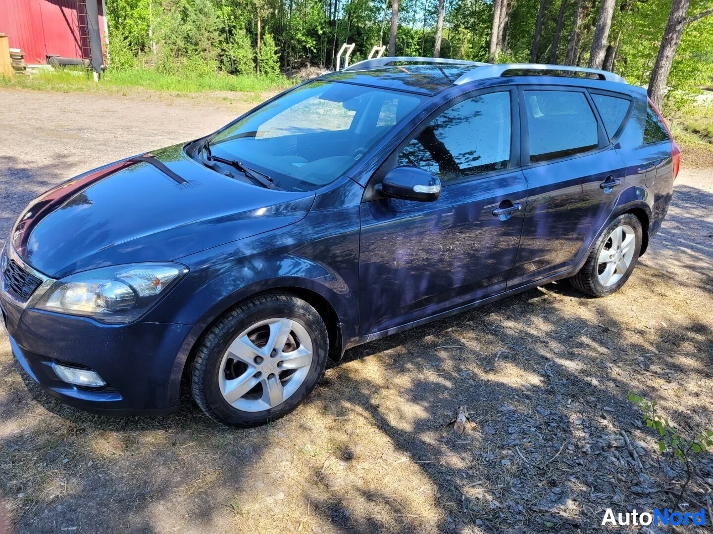 Sininen Kia Ceed 2011, etuviisto, keula vasemmalle, kuva 2