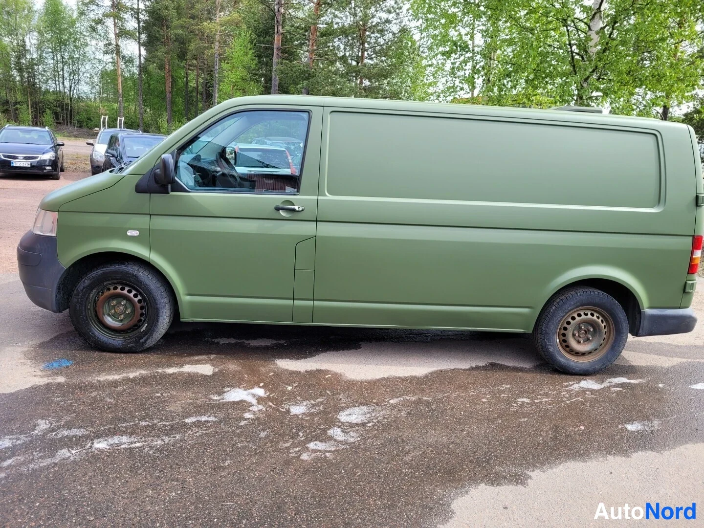 Vihreä Volkswagen Transporter 2005, sivulta, kuva 4