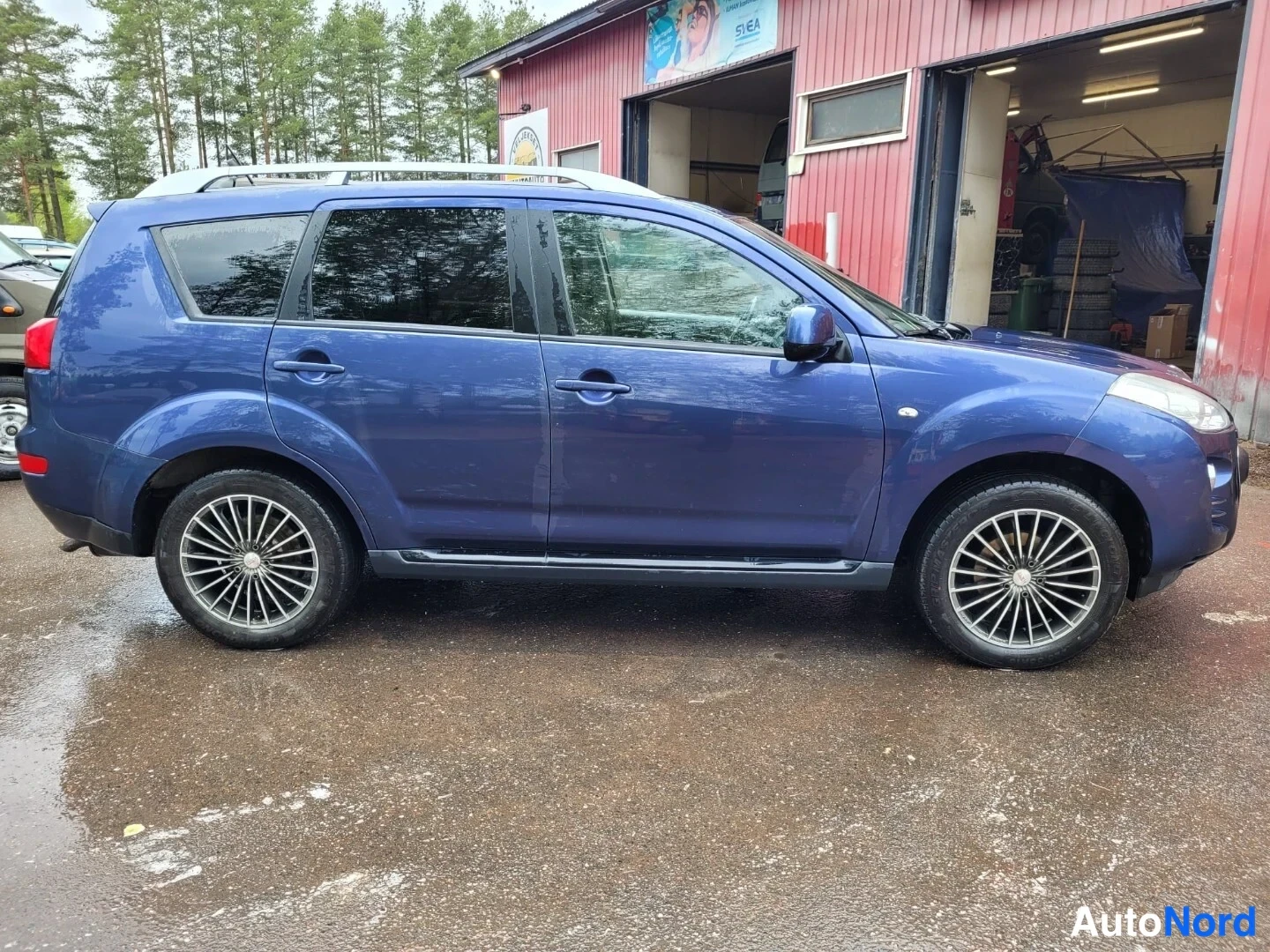Sininen Peugeot 4007 2007, sivulta, kuva 5