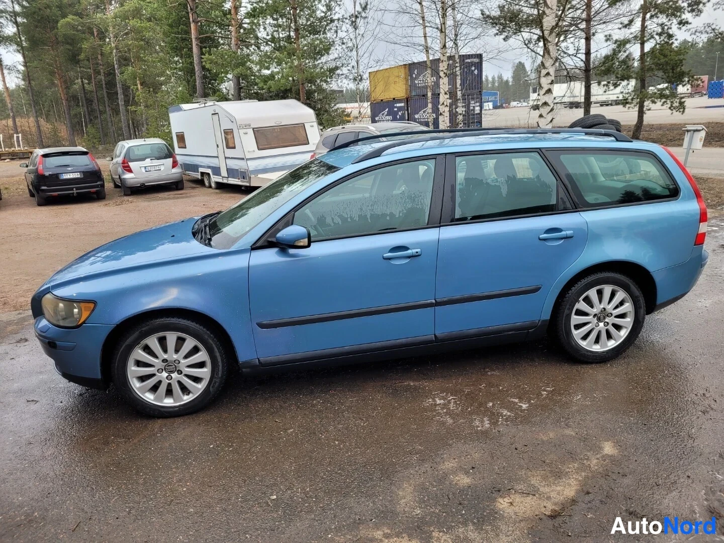 Turkoosi Volvo V50 2005, etuviisto, keula vasemmalle, kuva 2