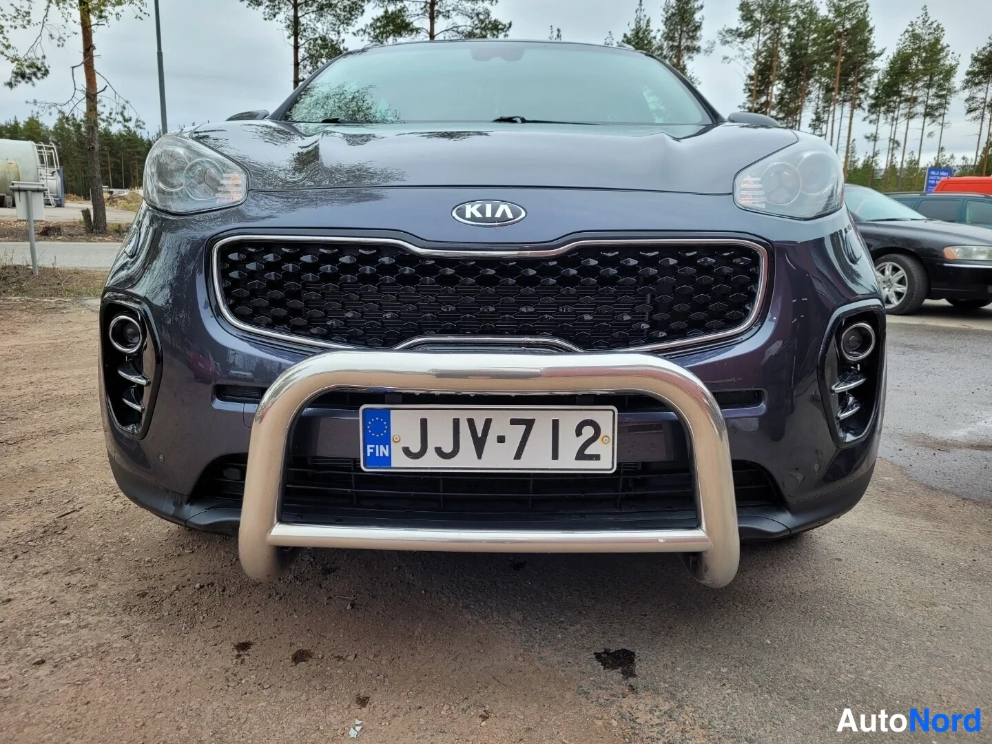 Grå Kia Sportage 2016, framifrån, bild 3