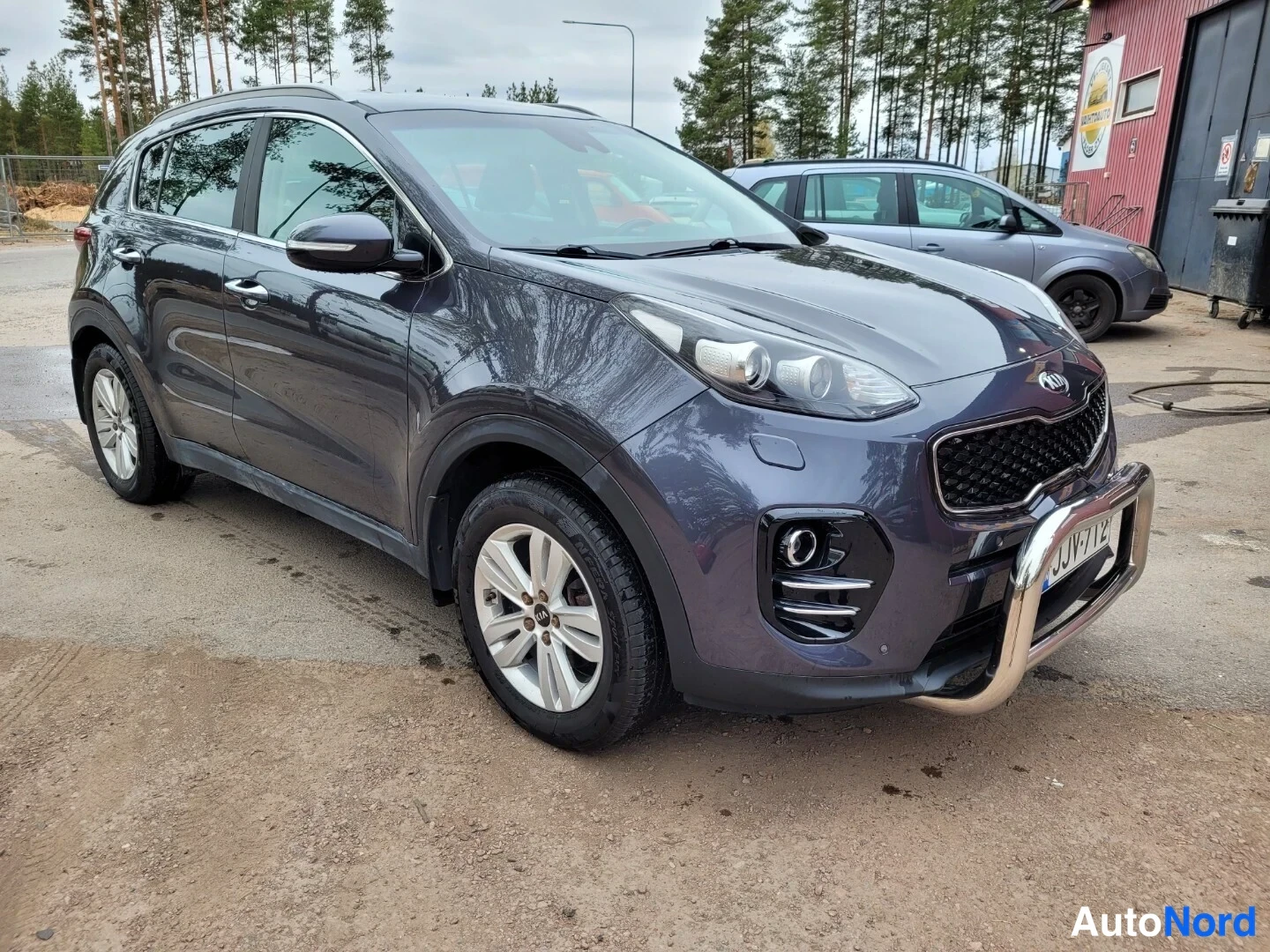 Grå Kia Sportage 2016, snett framifrån, fronten åt höger, bild 2