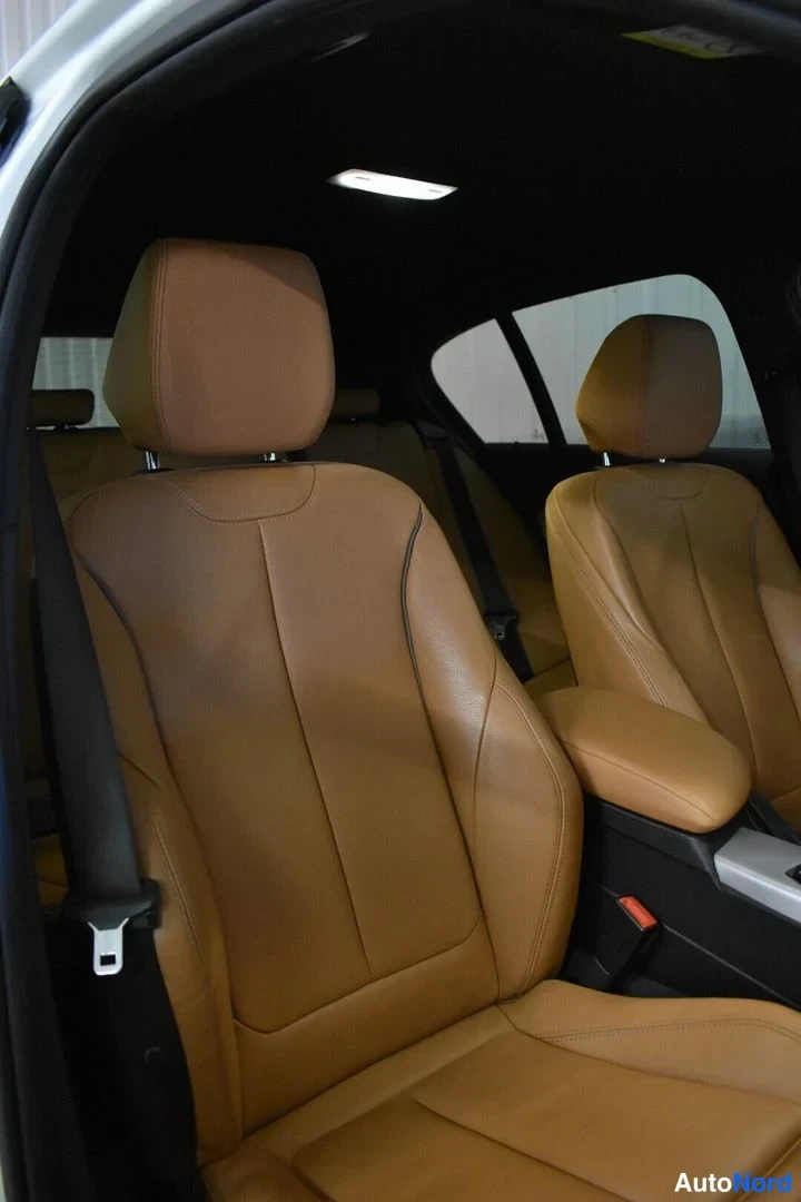 Valkoinen BMW M140i xDrive 2019, etuistuimet, kuva 21