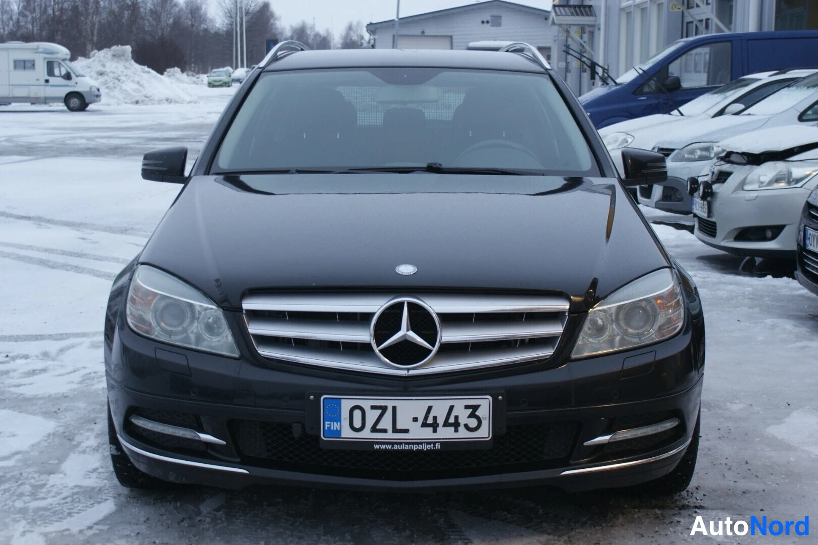 Musta Mercedes-Benz C 250 CDI 4MATIC 2011, edestä, kuva 4