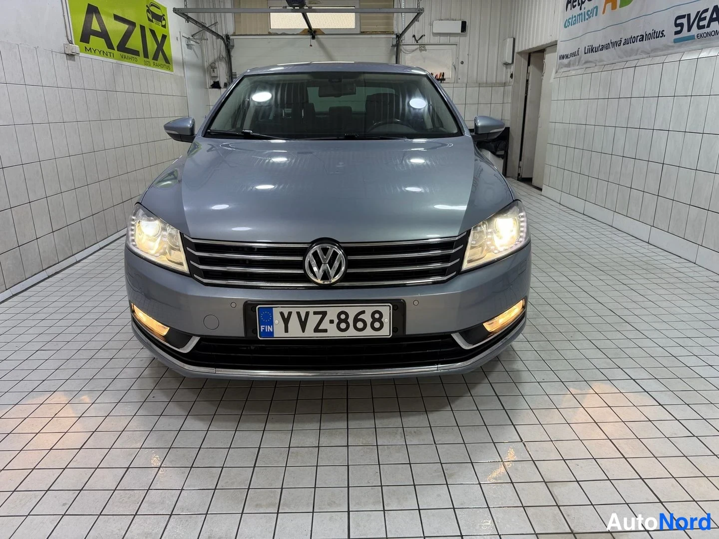 Sininen Volkswagen Passat 2013, edestä, kuva 6