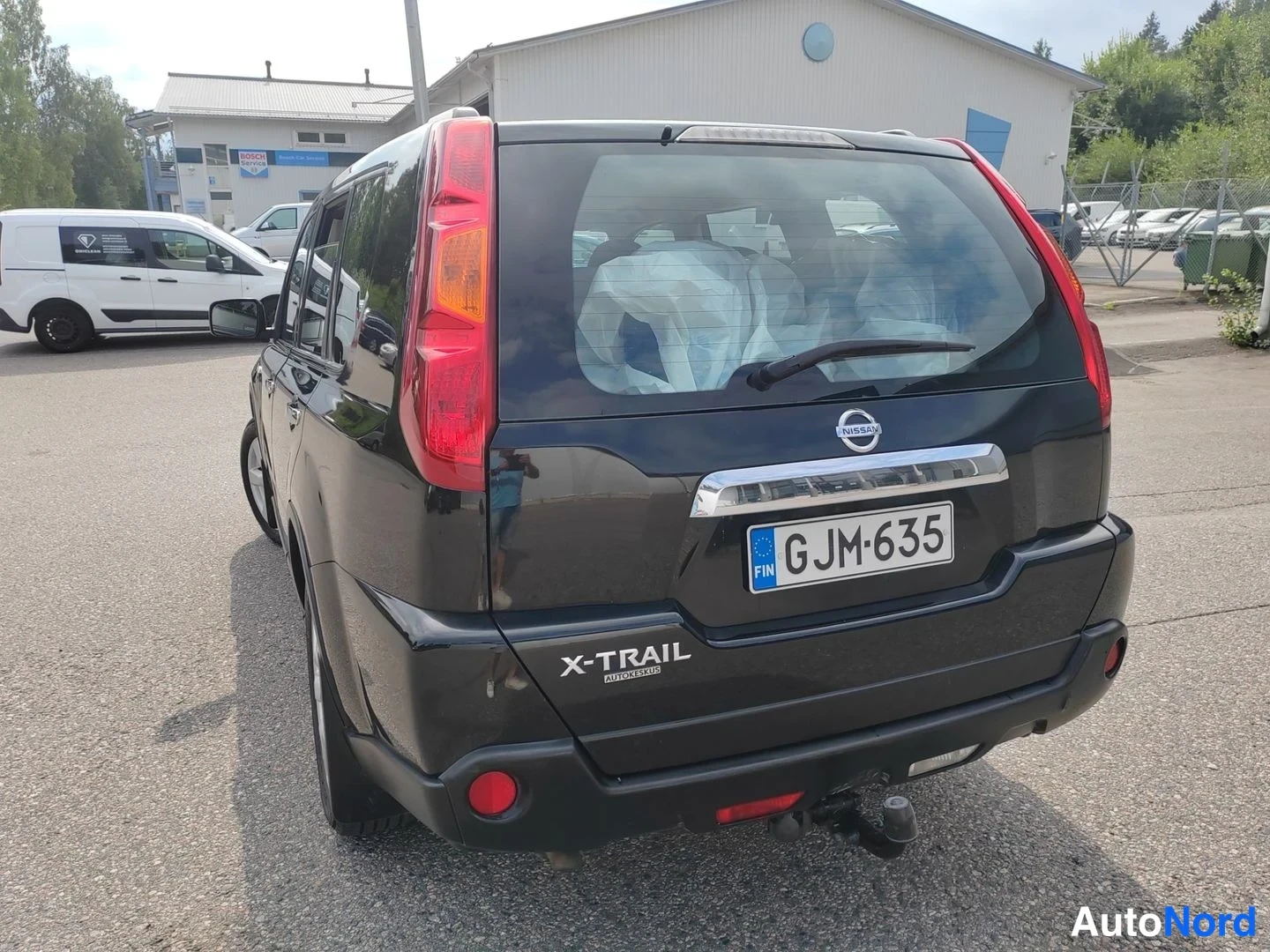 Black Nissan X-Trail 2011, rear three-quarter, photo 6