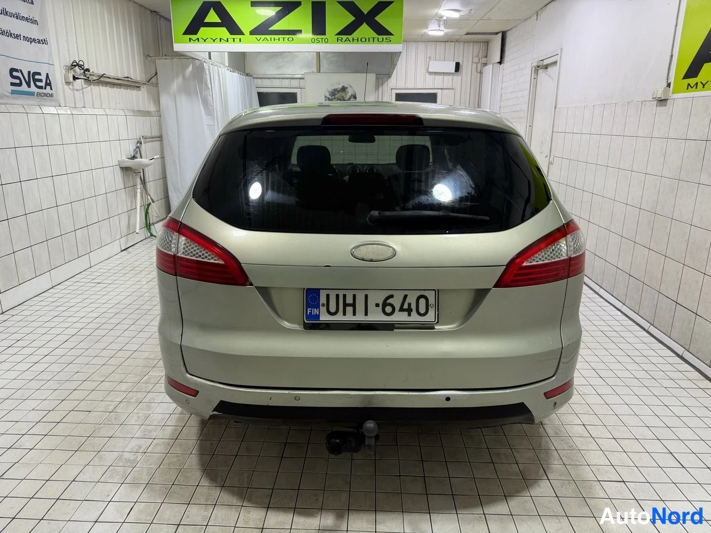 Beige Ford Mondeo 2010, bakifrån, bild 11