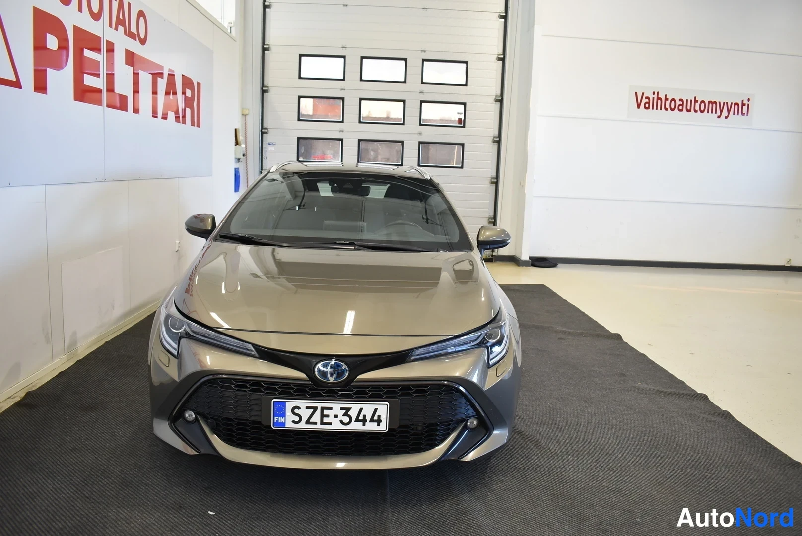 Ruskea Toyota Corolla 2021, edestä, kuva 6