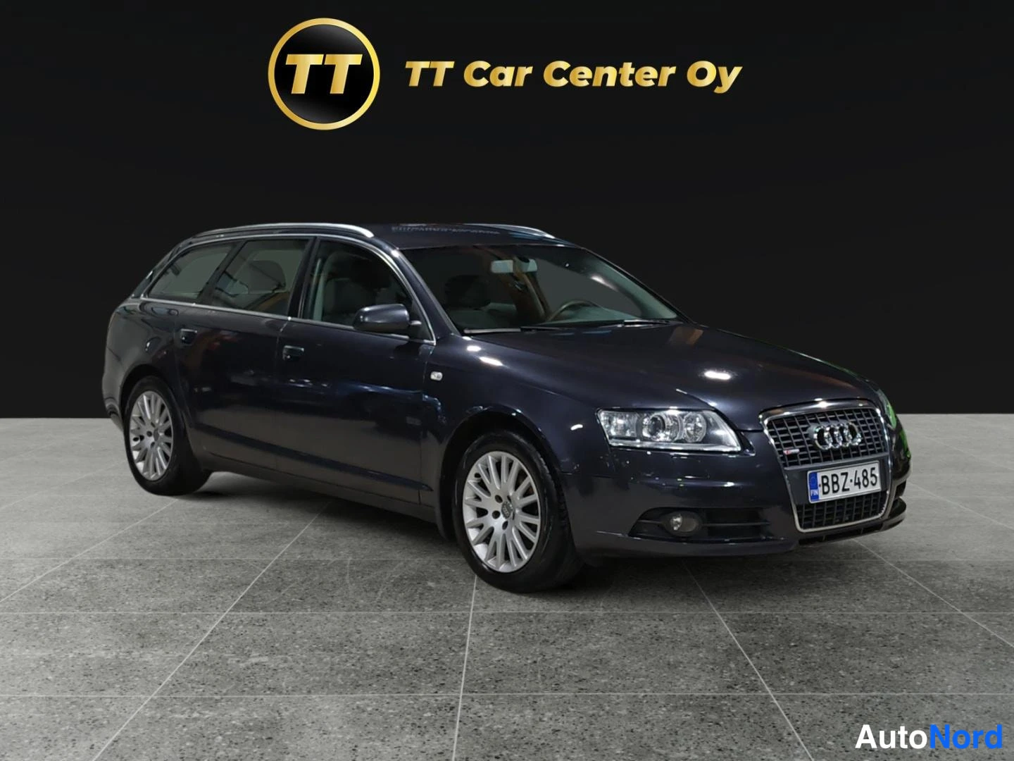 Sininen Audi A6 2008, etuviisto, keula oikealle, kuva 2