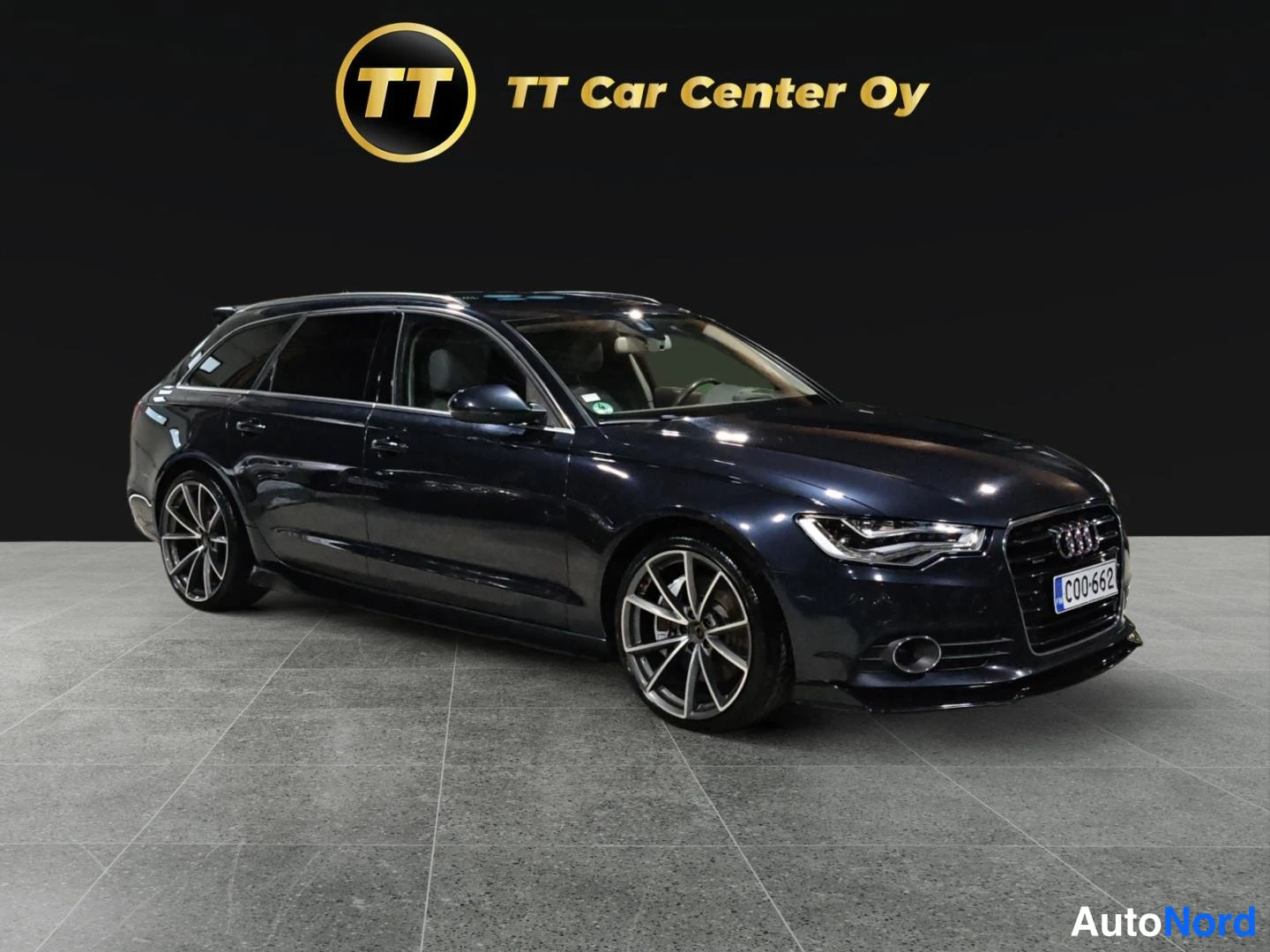 Sininen Audi A6 2012, etuviisto, keula oikealle, kuva 2