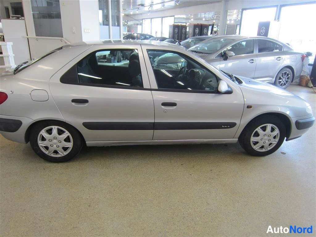 Harmaa Citroen Xsara 1998, sivulta, kuva 4