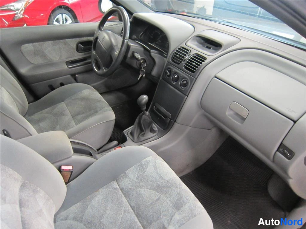 Sininen Renault Laguna 1999, ohjaamo, kuva 7