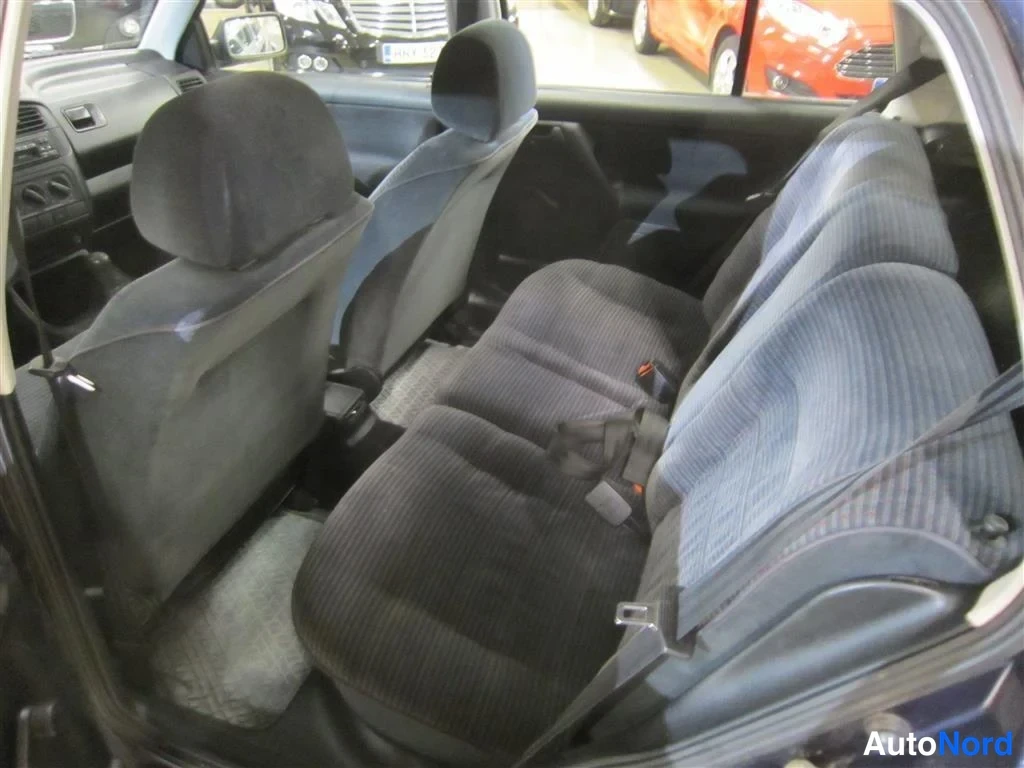 Sininen Volkswagen Golf 1994, takaistuimet, kuva 12