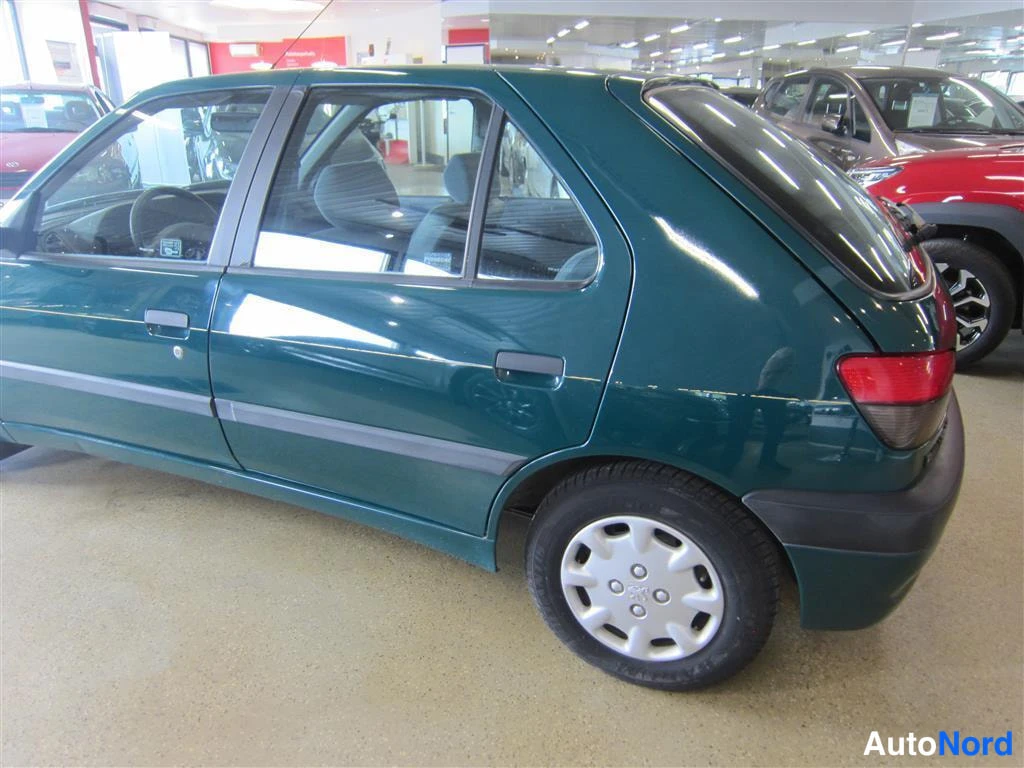 Vihreä Peugeot 306 1997, takaviisto, kuva 7