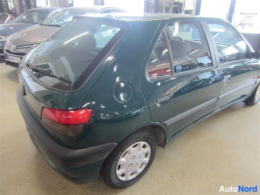 Vihreä Peugeot 306 1997, takaviisto, kuva 6