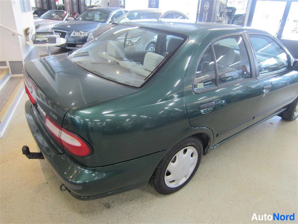 Vihreä Nissan Almera 1999, takaviisto, kuva 11