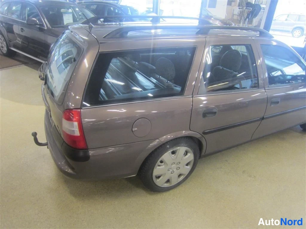 Beige Opel Vectra 1998, takaviisto, kuva 7