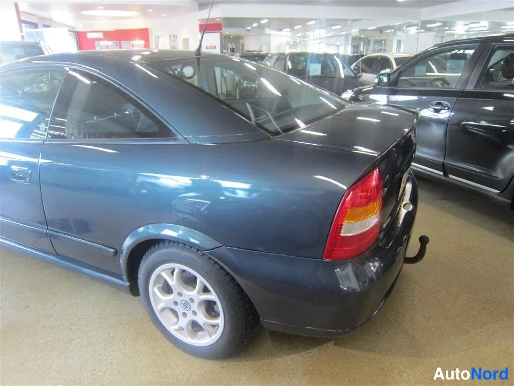 Vihreä Opel Astra 2000, takaviisto, kuva 5