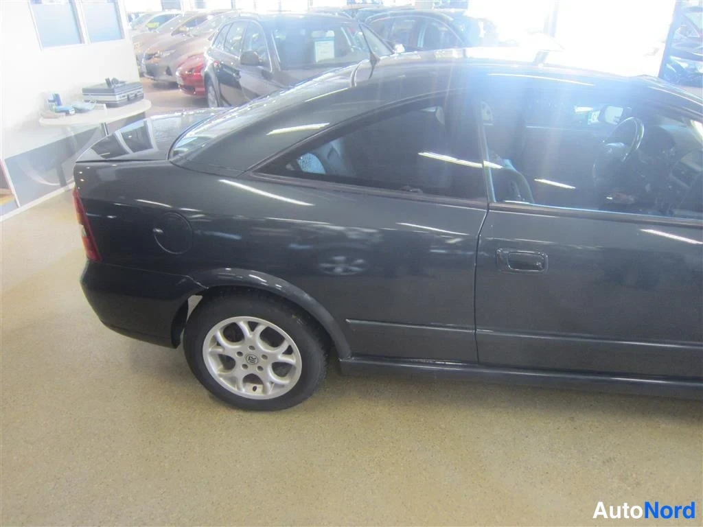 Vihreä Opel Astra 2000, takaviisto, kuva 6