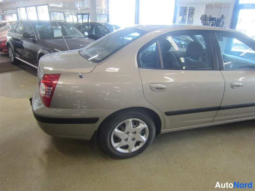 Beige Hyundai Elantra 2006, takaviisto, kuva 7