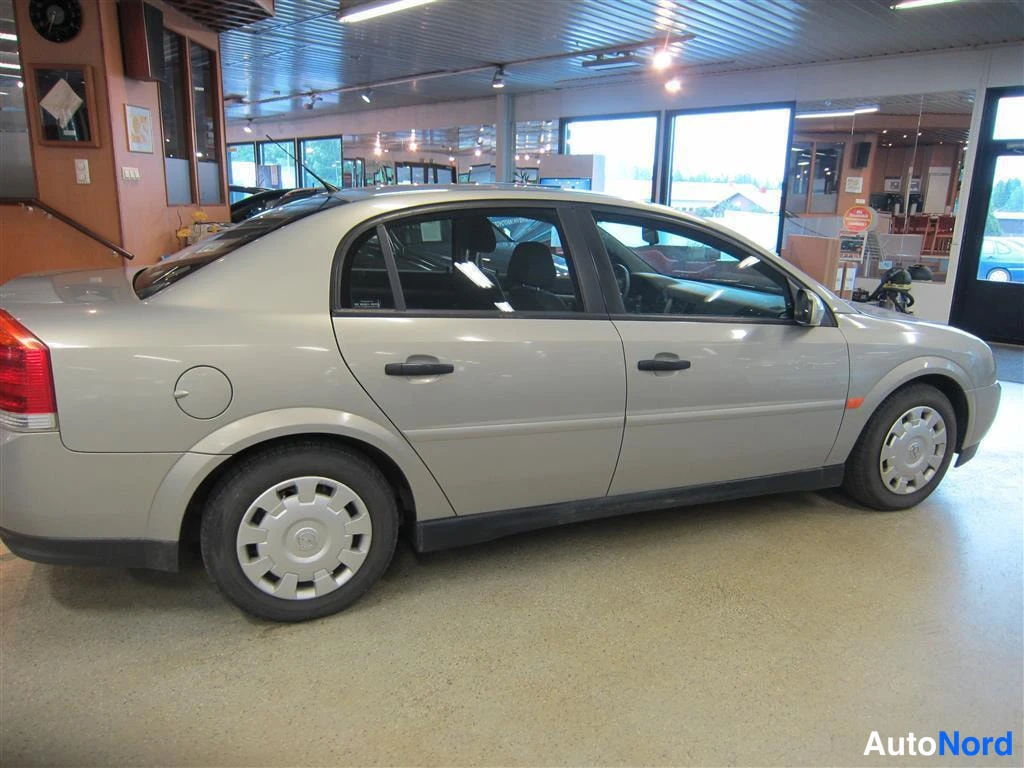 Beige Opel Vectra 2006, sivulta, kuva 4